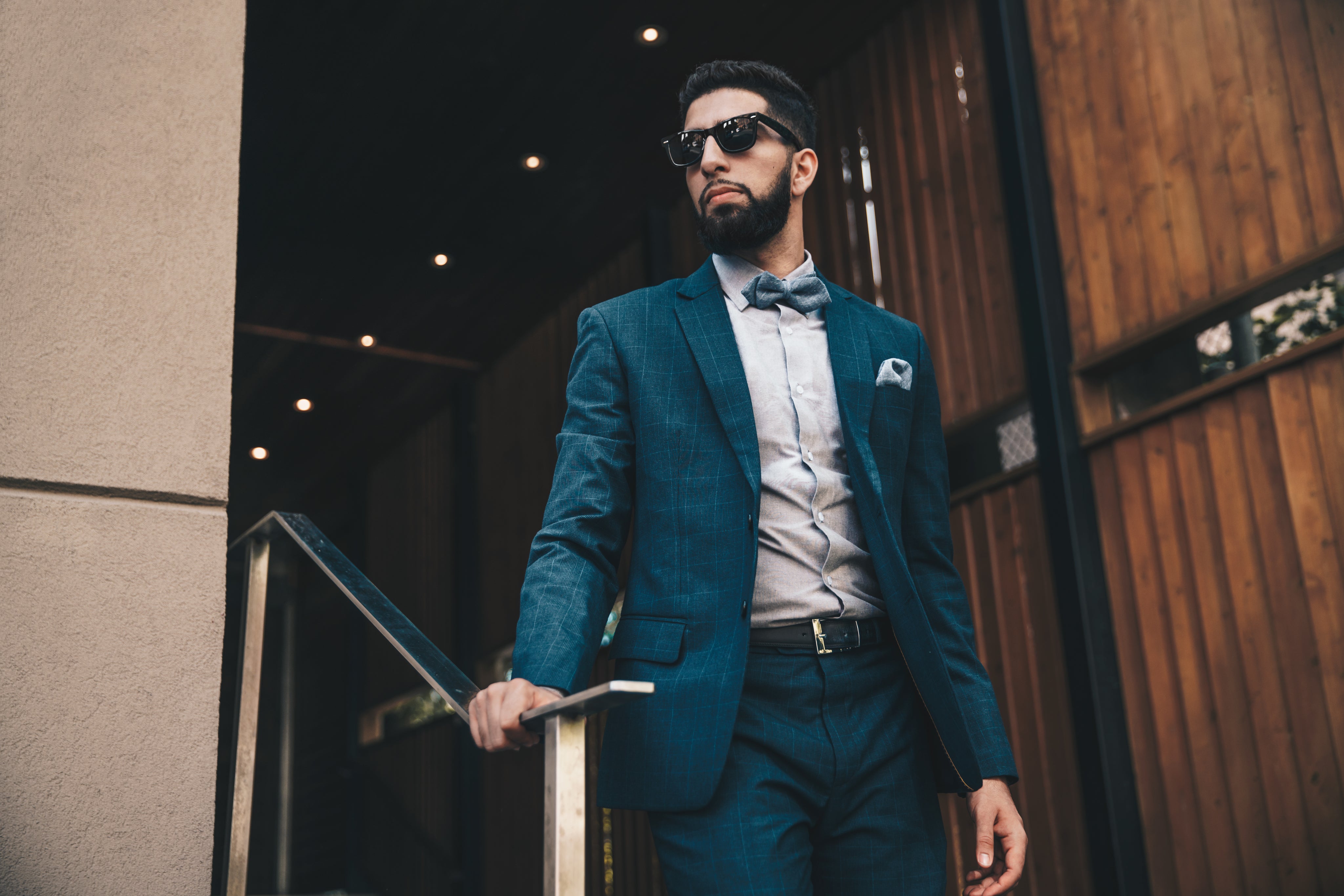 Man in suit on stairs