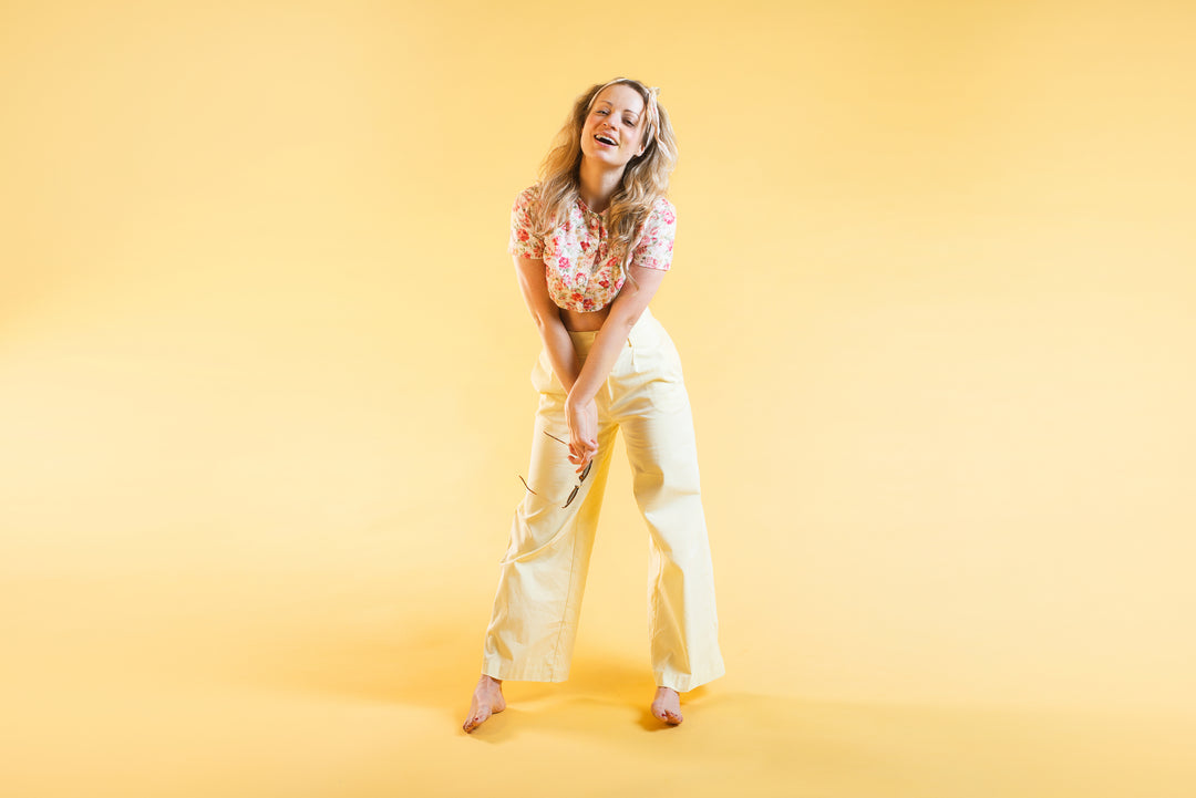 Model laughs barefoot